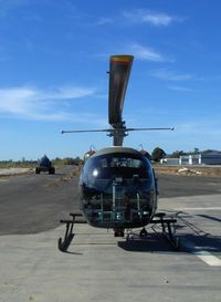 N8503F @ SZP - 1965 Bell 47G-4, Lycoming VO-540 305 Hp, repaved tiedown area in preparation behind - by Doug Robertson