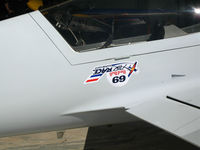 N716GW @ OAK - Logo on McGyver Airshows 2006 Ward MX2 following Fleet week Red Bull air race @ Oakland International Airport, CA - by Steve Nation