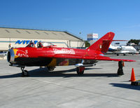 N117BR @ OAK - Bright red Mig Magic Inc. LIM-5 as NX117BR at Fleet Week air show @ Oakland International Airport, CA - by Steve Nation