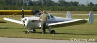 N3760H @ W03 - Securing the Ercoupe before taking in the sights