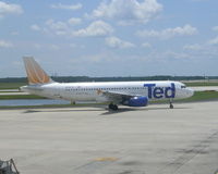 N484UA @ MCO - Orlando TED - by Florida Metal