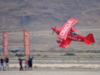 N260SP @ LSV - Pitts S2B LLC - Salinas, California / 1981 Oliver Steven R PITTS S-2S / Sean Tucker behind the stick. Wow...what a pilot! Hopefully the first photo from the Aviation Nation at Nellis AFB. - by Brad Campbell