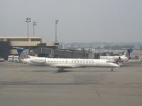 N36915 @ EWR - Continental Express EMB-145 taxiing out - by Ken Wang