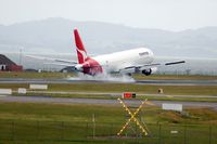 VH-OGG @ AKL - Burning rubber at touch-down in Auckland - by Micha Lueck