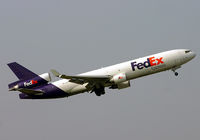 N610FE @ RJAA - MD11