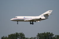 N977TW @ YIP - Falcon