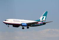 N307AT @ ATL - On final for Runway 27L - by Michael Martin