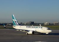 C-FKWS @ YYZ - Leaving Toronto - by Micha Lueck