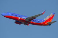 N449WN @ LAX - Southwest Airlines N449WN (FLT SWA2452) climbing out from RWY 25R enroute to Tucson Int'l (KTUS).