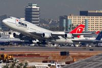 N662US @ LAX - Northwest Airlines N662US (FLT NWA1) climbing out from RWY 25R enroute to Narita Int'l (RJAA).
