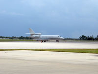 N900LC @ KISM - Sitting on the ramp waiting to be serviced - by Peter Steinmaker