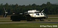 N308HP @ W03 - Early morning sun gleaming on this helo