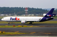 N513FE @ RJAA - MD-11