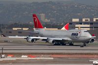 N662US @ LAX - Northwest Airlines N662US (FLT NWA1), destined for Narita Int'l (RJAA), taxiing through the alley on her way to RWY 25R.