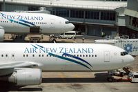 ZK-NCK @ AKL - In the background B 777-200 (ZK-OKE) - by Micha Lueck