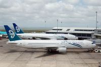 ZK-NCK @ AKL - In the background B 777-200 (ZK-OKE) - by Micha Lueck