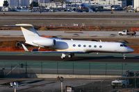 N721MM @ LAX - MGM Mirage 2000 Gulfstream G-V taxiing to Mercury parking after arrival on the north complex from Bob Hope (KBUR).