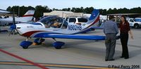 N902HB @ GSB - Nice company rep extoling the Ekevtor's virtues
