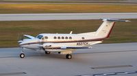 N527CH @ HOU - Taxis by the Air Terminal Museum in low light. - by Michael Bludworth