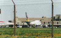 G-BNLO @ DTW - In Ndebele Emily World tail colors back in 2000 - by Florida Metal