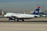 N839AW @ KLAS - US Airways / 2006 Airbus A319-132 / Somewhere behind the terminal, something is on fire. - by Brad Campbell
