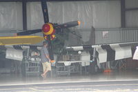 N451MG @ YIP - Jack Roush's Old Crow P-51 in hangar getting worked on - by Florida Metal