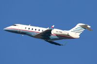 XA-FRD @ LAX - A nice-looking Canadair Challenger 300 climbing out from RWY 25R. - by Dean Heald