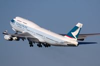 B-HOO @ LAX - A very heavy Cathay Pacific B-HOO (FLT CPA885) climbing out from RWY 25R enroute to Hong Kong Int'l (VHHH). - by Dean Heald