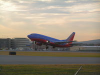 N503SW @ MHT - late afternoon take-off from runway 17 southbound - by John Newall