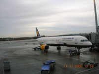 TF-FIN @ ENGM - B757 with winglets at gate in Oslo, Norway - by John J. Boling