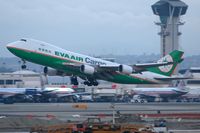 B-16482 @ LAX - EVA Air Cargo B-16482 (FLT EVA605) departing RWY 25R on a stormy evening enroute to Chiang Kai Shek Int'l (RCTP). - by Dean Heald