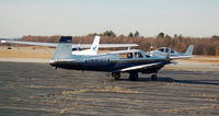 N201UA @ KASH - Mooney Running up before departure from Nashua - by Nick Michaud
