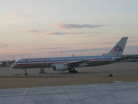 N611AM @ KTUL - American 757 at remote parking - by John J. Boling