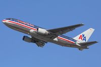 N329AA @ LAX - American Airlines N329AA (AAL4) climbing out from RWY 25R enroute to John F Kennedy Int'l (KJFK). - by Dean Heald