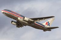 N338AA @ LAX - American Airlines N338AA (FLT AAL22) climbing out from RWY 25R enroute to Dallas Fort Worth Int'l (KDFW). - by Dean Heald