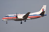 N390AE @ LAX - American Eagle N390AE on short final to RWY 25R after departing just 15 minutes prior. Not sure why the plane returned so soon.