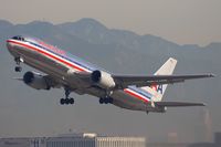 N353AA @ LAX - American Airlines N353AA (FLT AAL88) climbing out from RWY 25R in the morning, enroute to Chicago O'Hare Int'l (KORD). - by Dean Heald