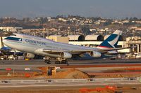 B-HUG @ LAX - Cathay Pacific B-HUG (FLT CPA881) departing RWY 25R enroute to Hong Kong Int'l (VHHH). - by Dean Heald