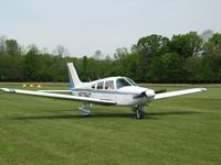 N679HC @ TRIPLE H - Taxi on grass field - by unnknown