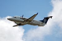 ZK-EAE @ WLG - Climbing out of Wellington - by Micha Lueck