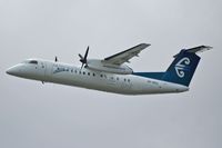 ZK-NED @ WLG - Climbing out of Wellington - by Micha Lueck