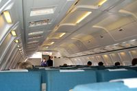 ZK-NQC @ AKL - Note the small overhead bins and the 3/4 partition walls of the old B737-200 - by Micha Lueck