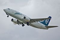 ZK-SJE @ WLG - Climbing out of Wellington - by Micha Lueck