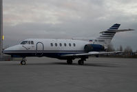 RA-02803 @ VIE - Bae 125