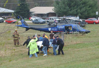 N109DU - Agusta Spa A109E picking up a patient after a police chase went bad at the Va.-N.C. line.The police cruiser was totaled along with others not involved in the chase. - by Richard T Davis