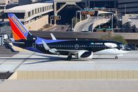 N713SW @ PHX - Southwest Airlines N713SW Shamu taxiing across the bridge to the C gates after arrival on RWY 8.