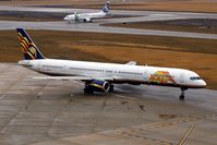 N552TZ @ KCID - Taxiing out for departure, seen from the tower on an overcast day - by Glenn E. Chatfield