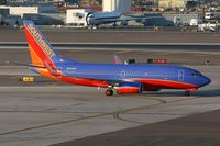 N200WN @ PHX - Southwest Airlines N200WN (FLT SWA340) from Detroit Metro Wayne County (KDTW) taxiing to the gate after arrival on RWY 26.