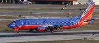 N302SW @ HOU - Turns off 30 after landing. Needs a repaint. - by Michael Bludworth
