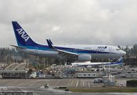 JA09AN @ KPAE - Touch and go at Paine Field. JA778A in the background.